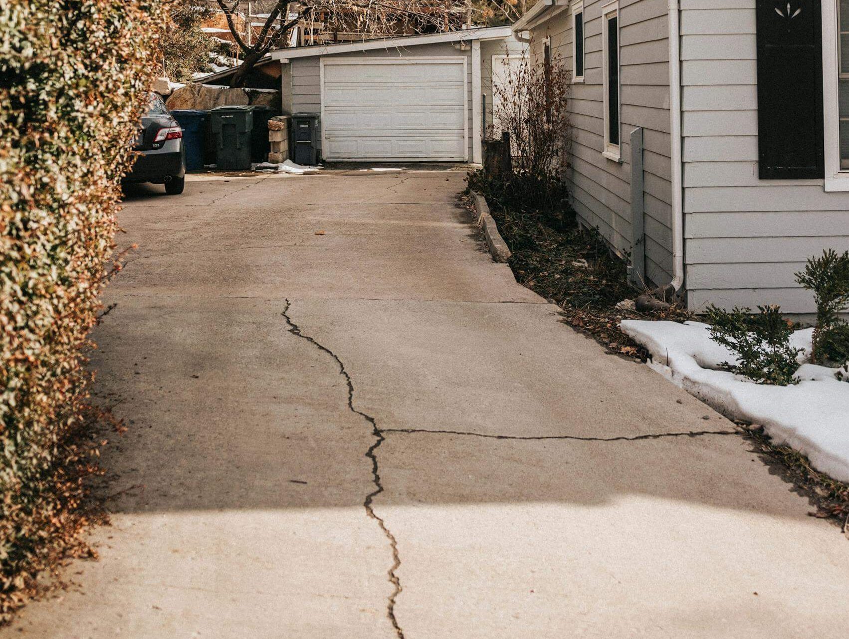 Cracked concrete driveway